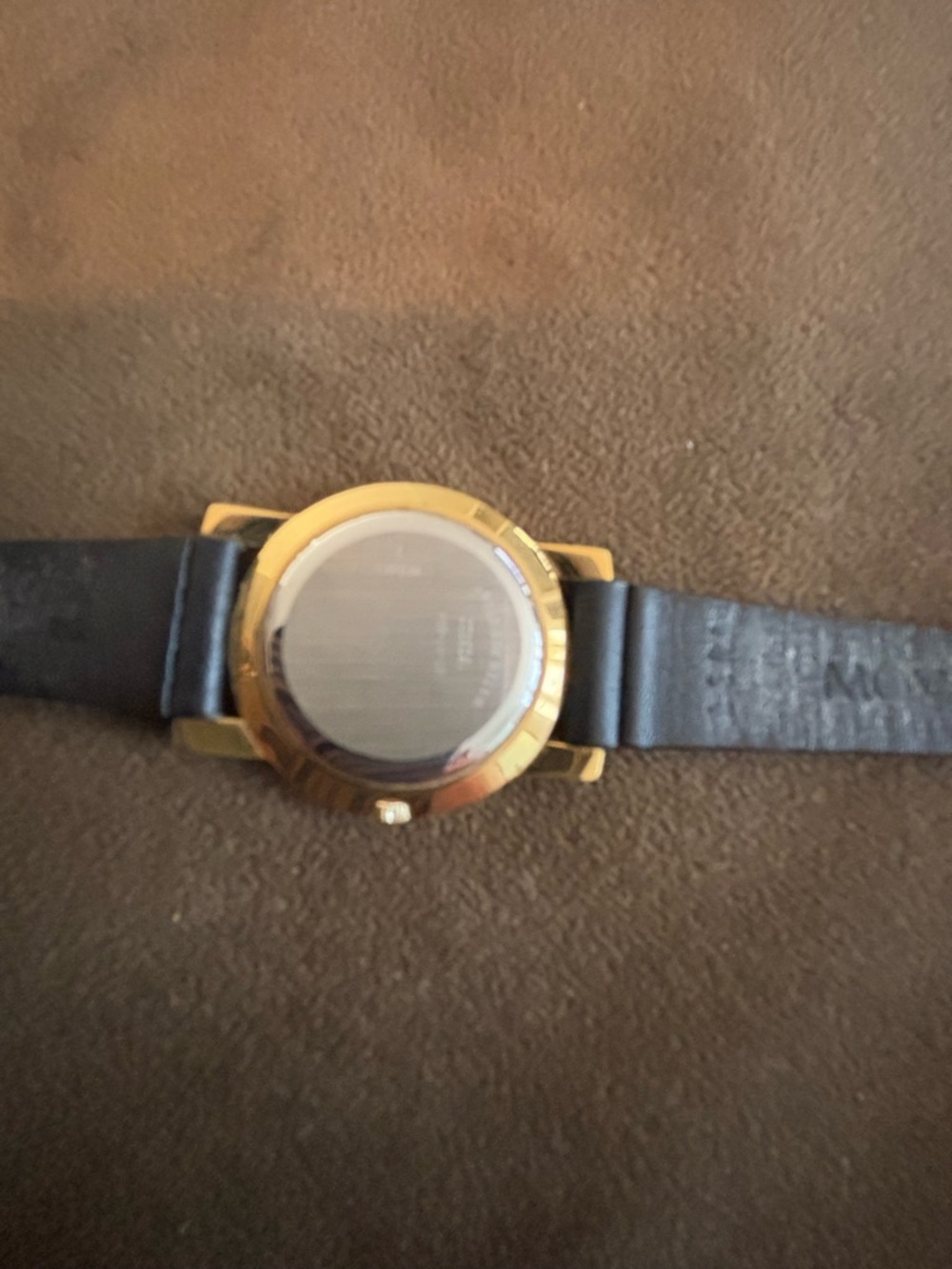 Movado gold tone women’s watch with black leather strap. - Picture 4 of 5